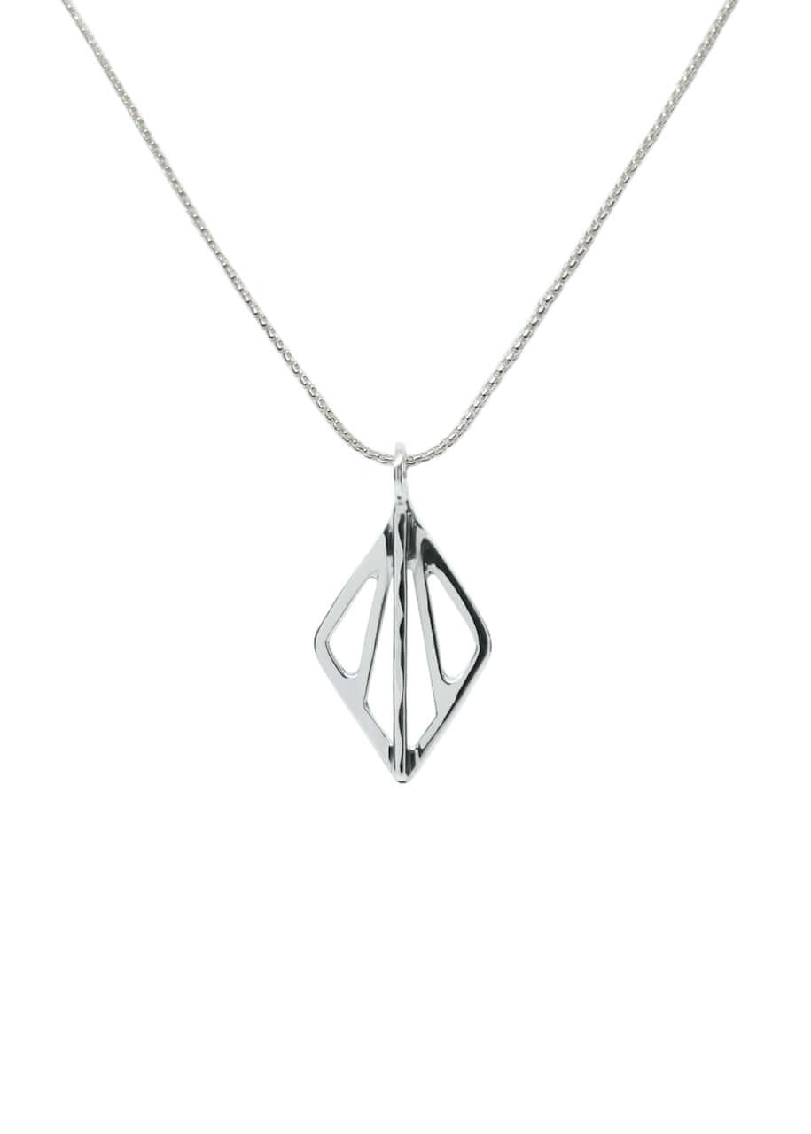 This sterling silver art deco pendant jewelry is shown on a silver chain