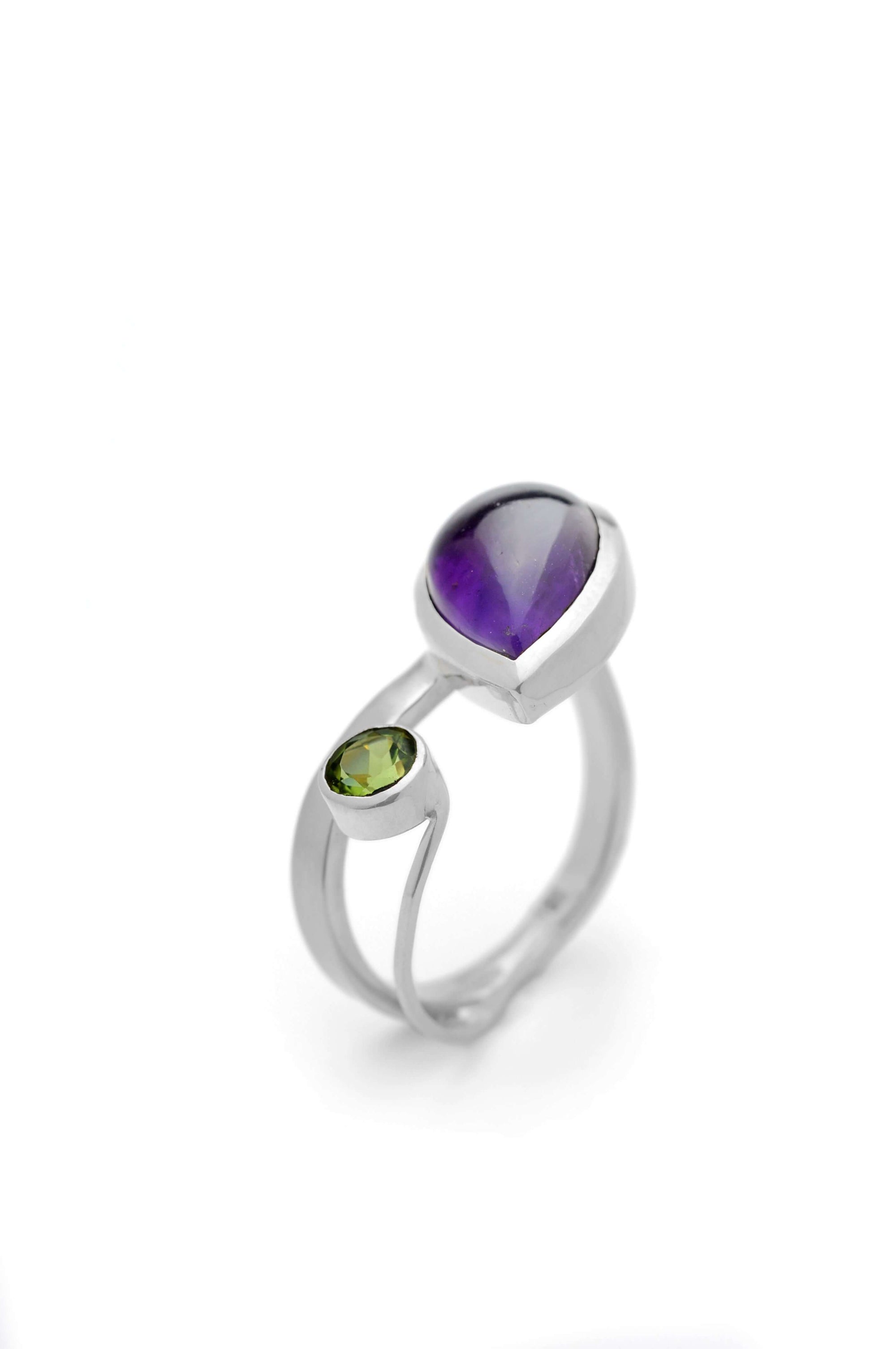 A sterling silver amethyst ring, a gap ring with peridot