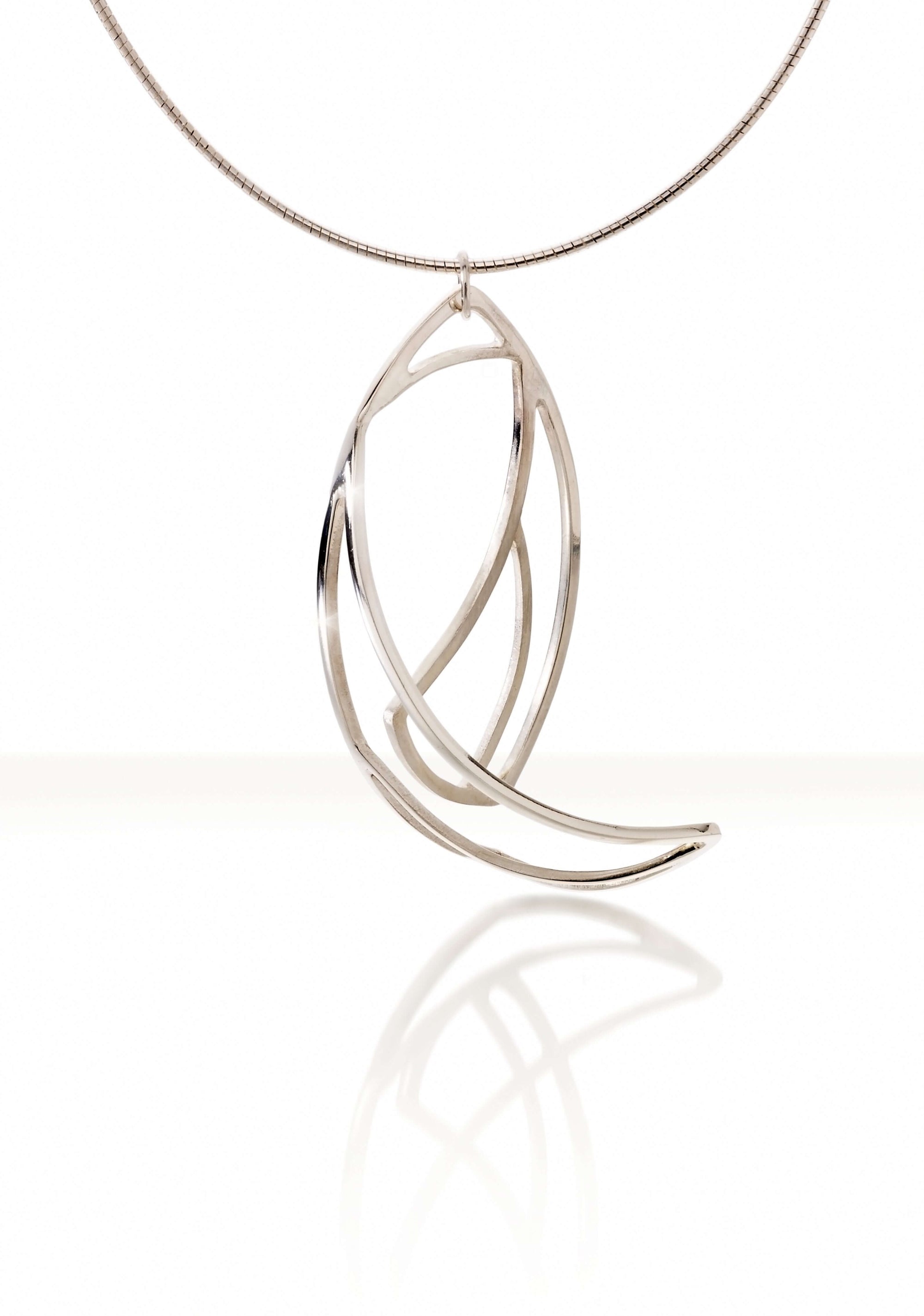 A sterling silver abstract pendant necklace on silver chain