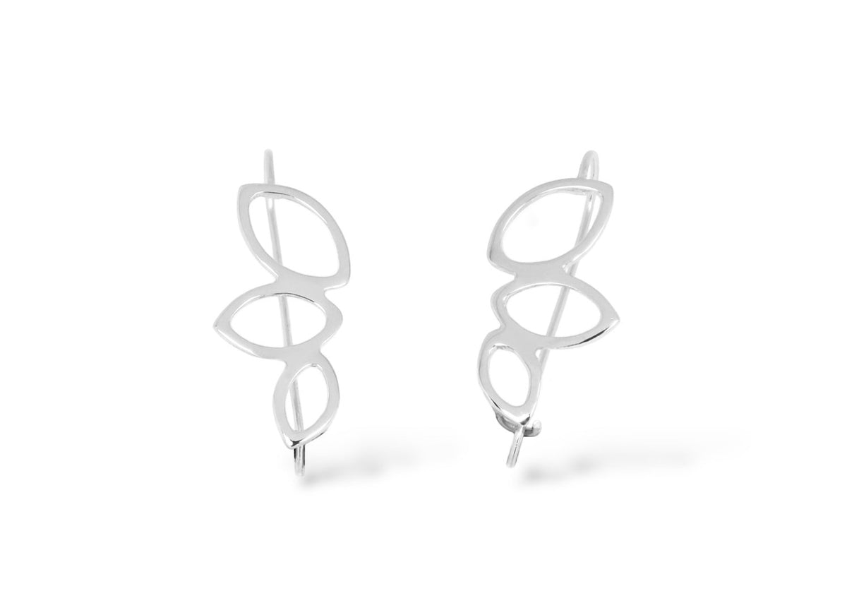 Pair of silver earrings on a white background