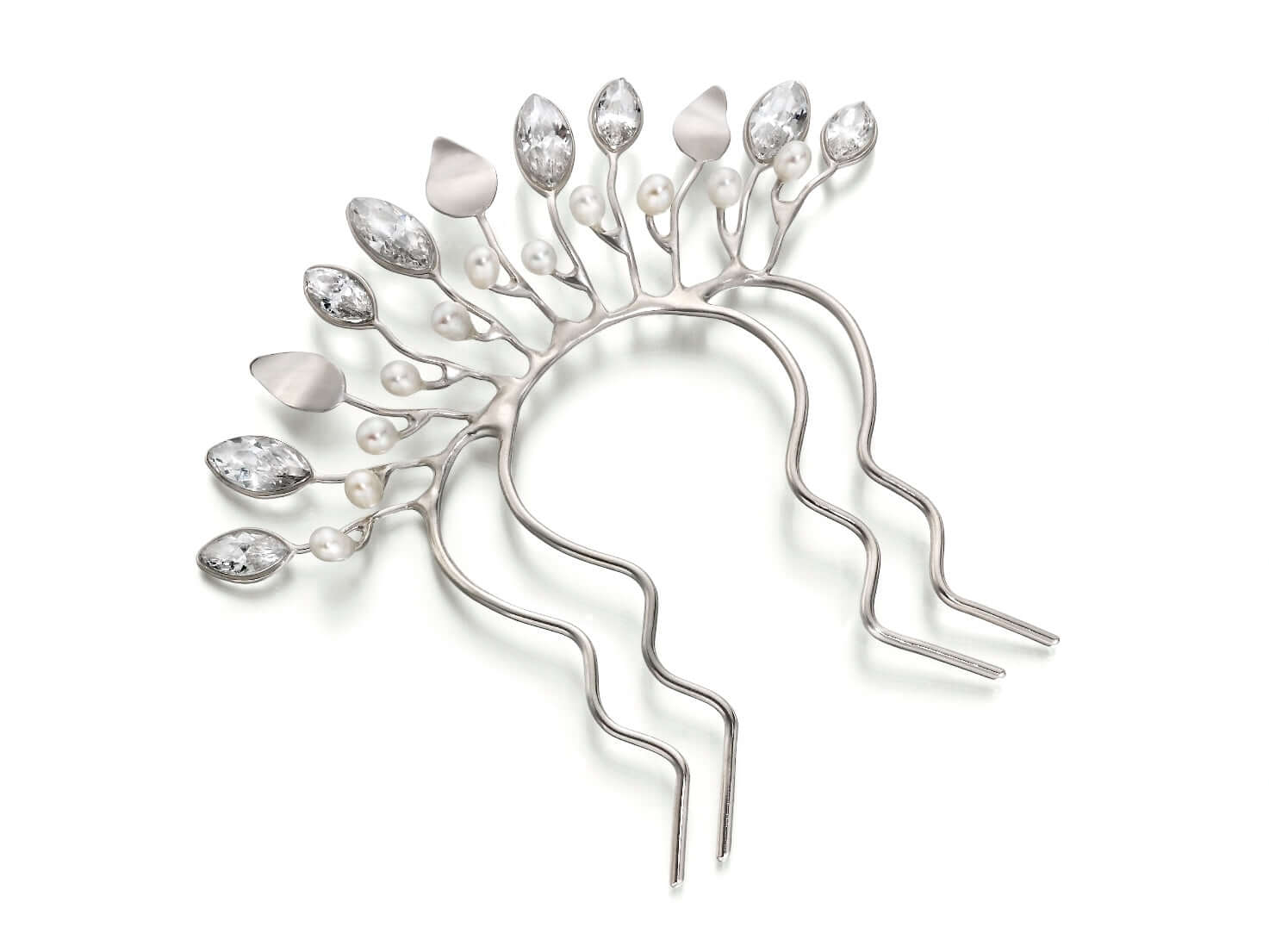 A handmade sterling silver leaf hair comb with cubic zirconia and freshwater pearls.