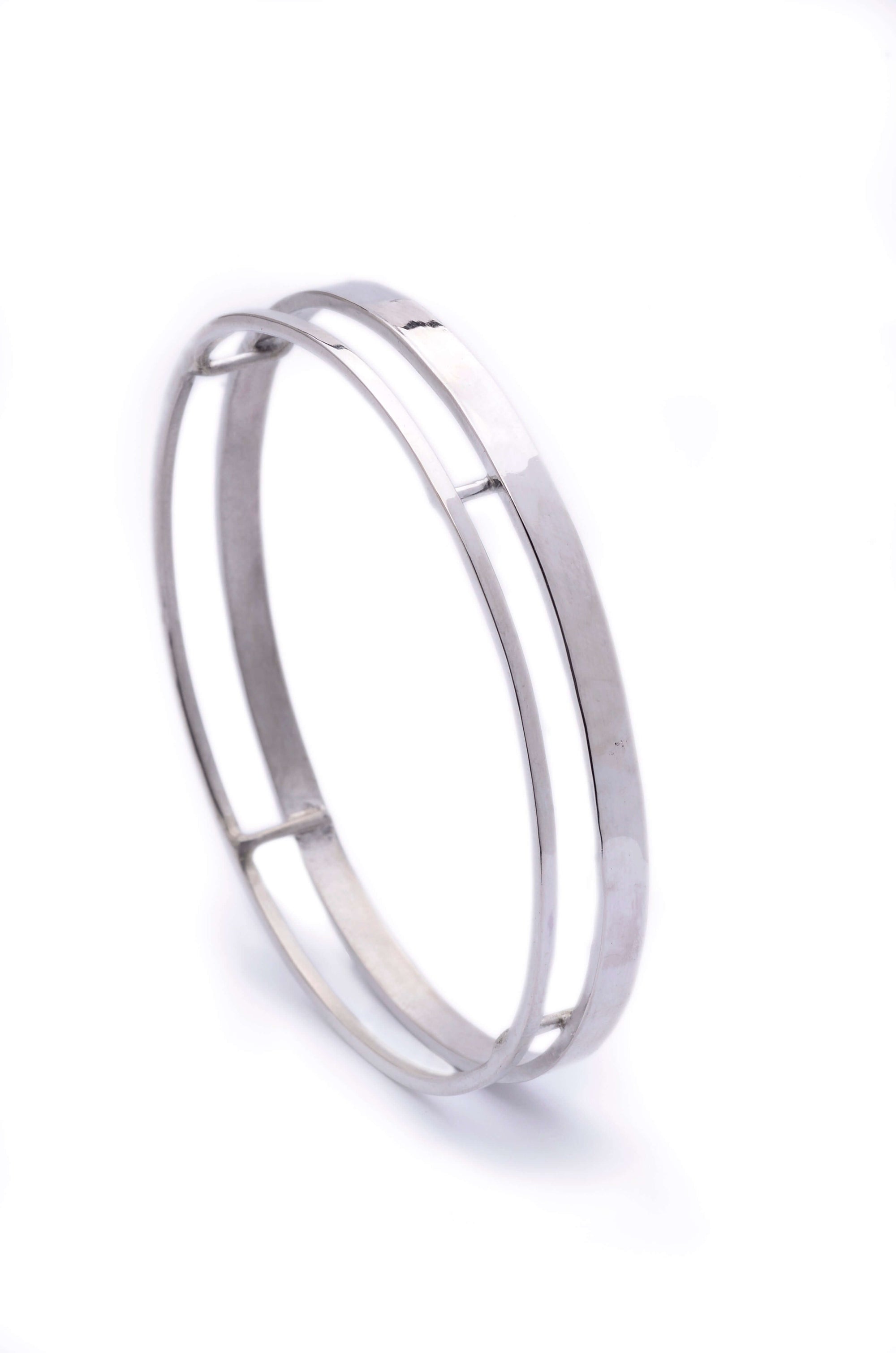 A sterling silver wide bangle bracelet with double band