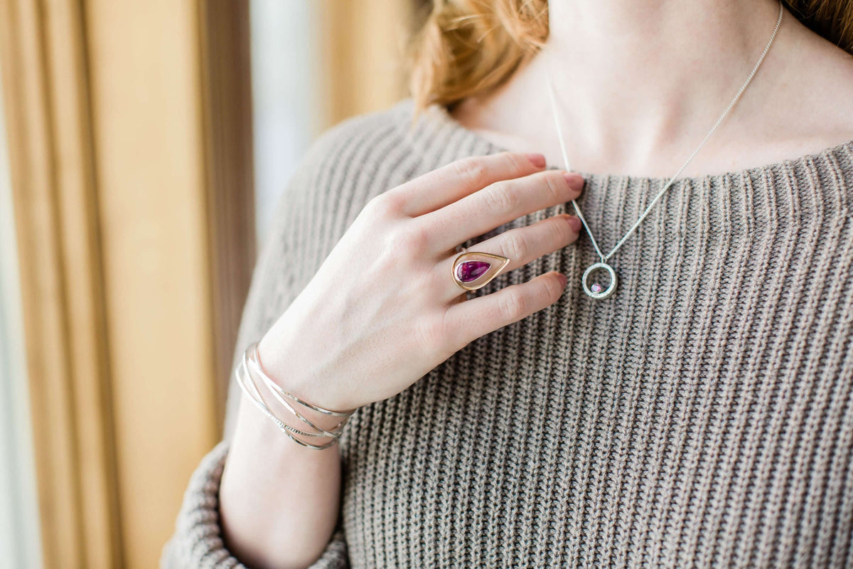 A model wears a sterling silver woven bracelet
