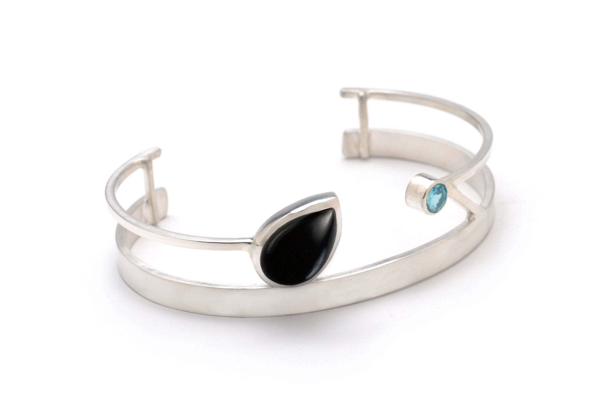 A handmade sterling silver black onyx cuff bracelet
