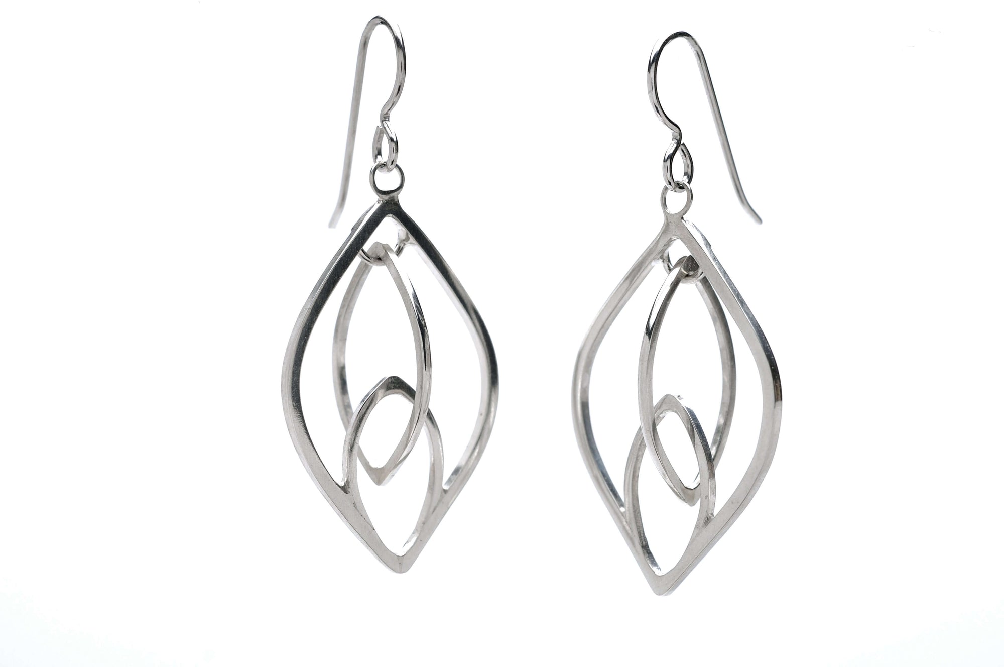 a pair of sterling silver lotus earrings