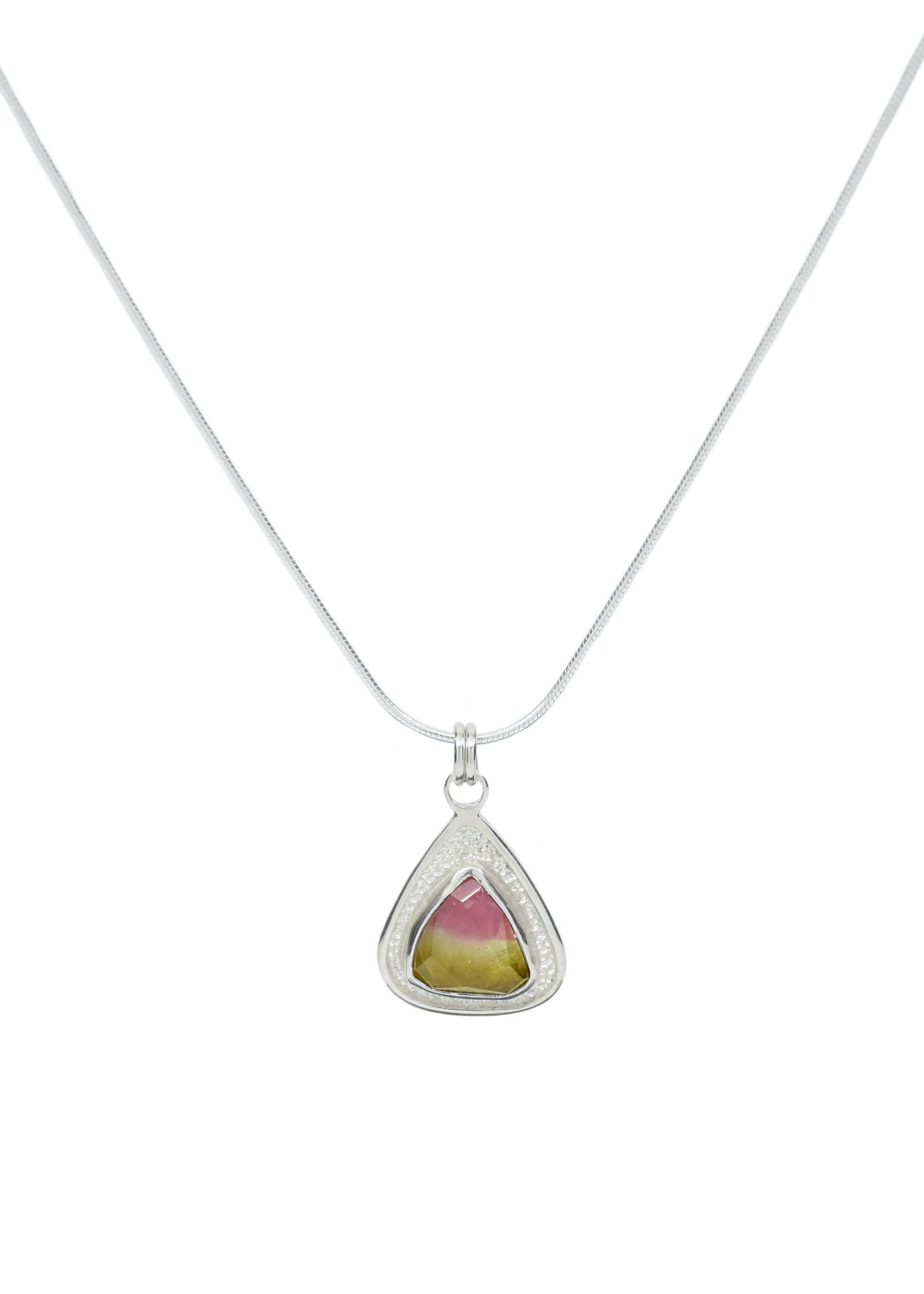A sterling silver rose cut tourmaline pendant on silver chain