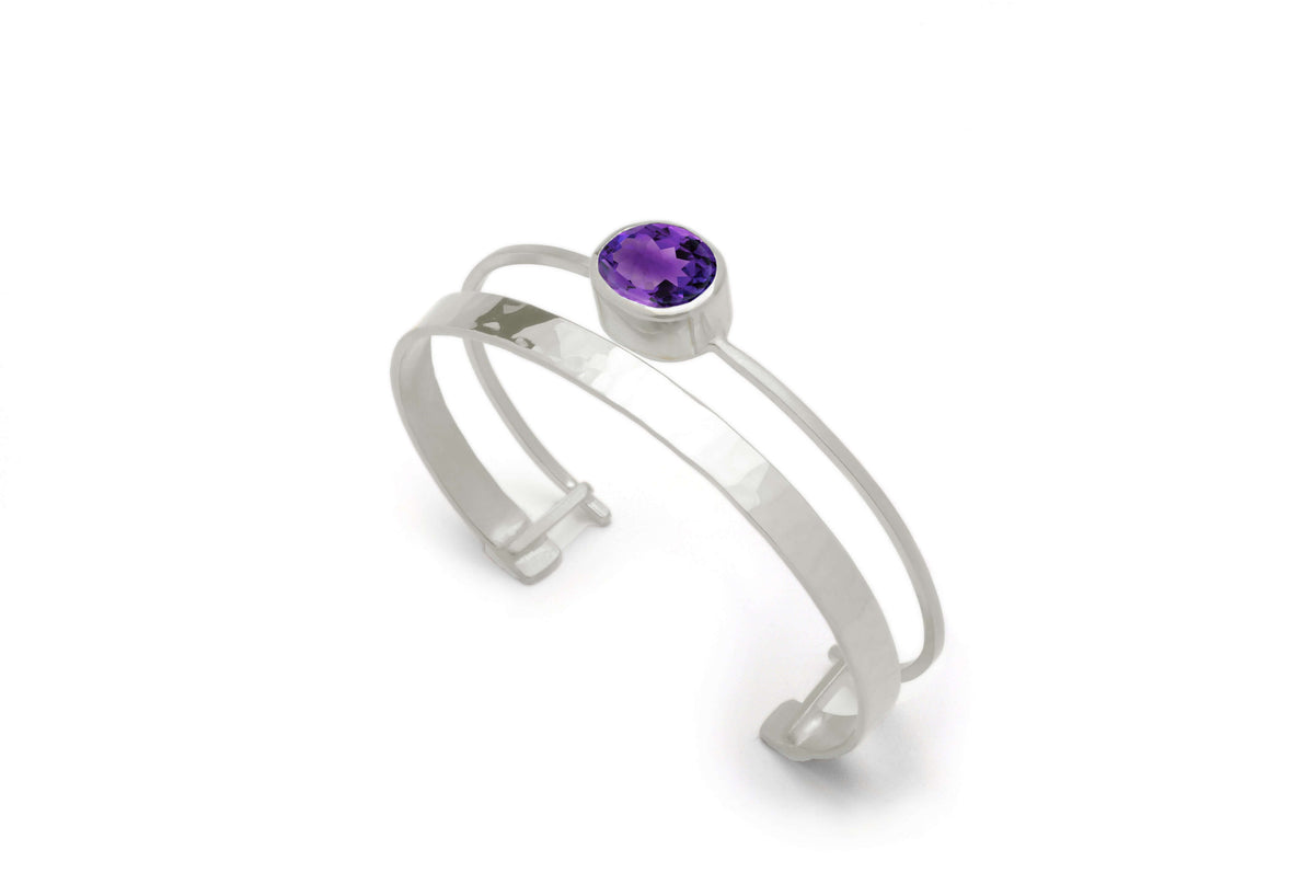 A sterling silver gemstone cuff bracelet with amethyst