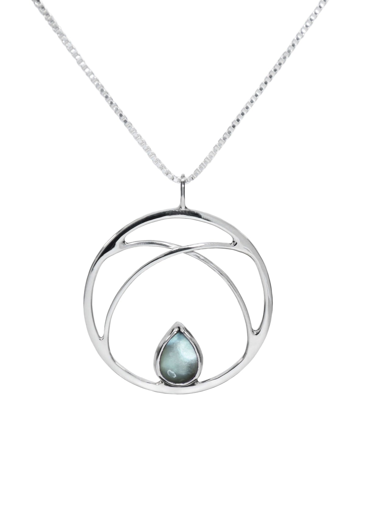 A handmade sterling silver necklace with circle pendant and sky topaz