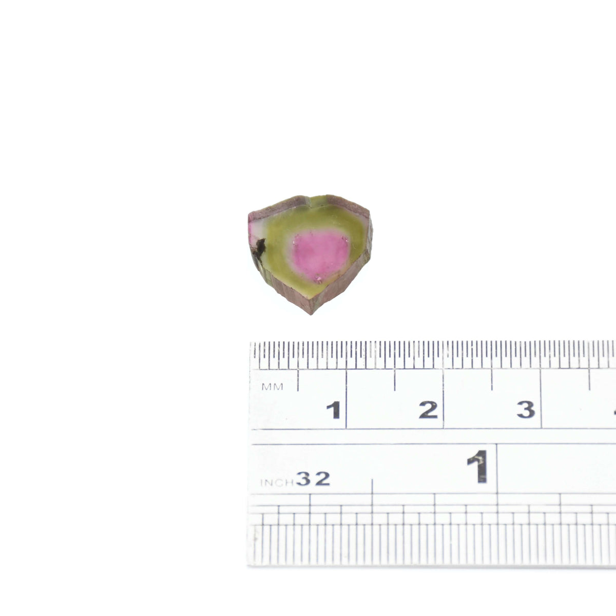 A bright green and pale pink loose watermelon tourmaline stone for custom jewelry