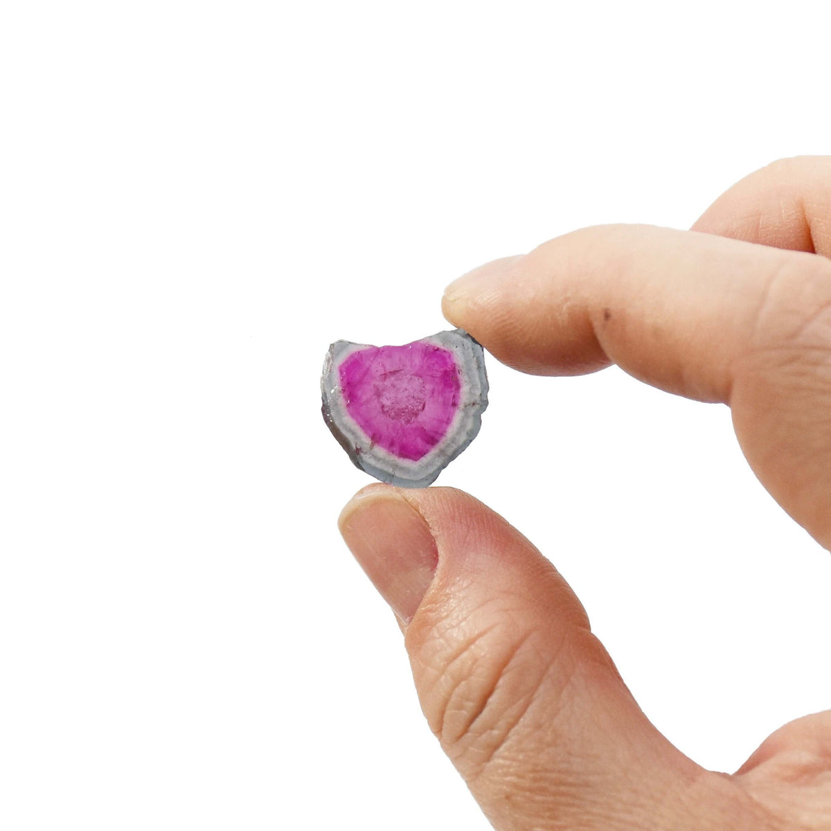 This genuine watermelon tourmaline slice has a heart shape and a large pink center.