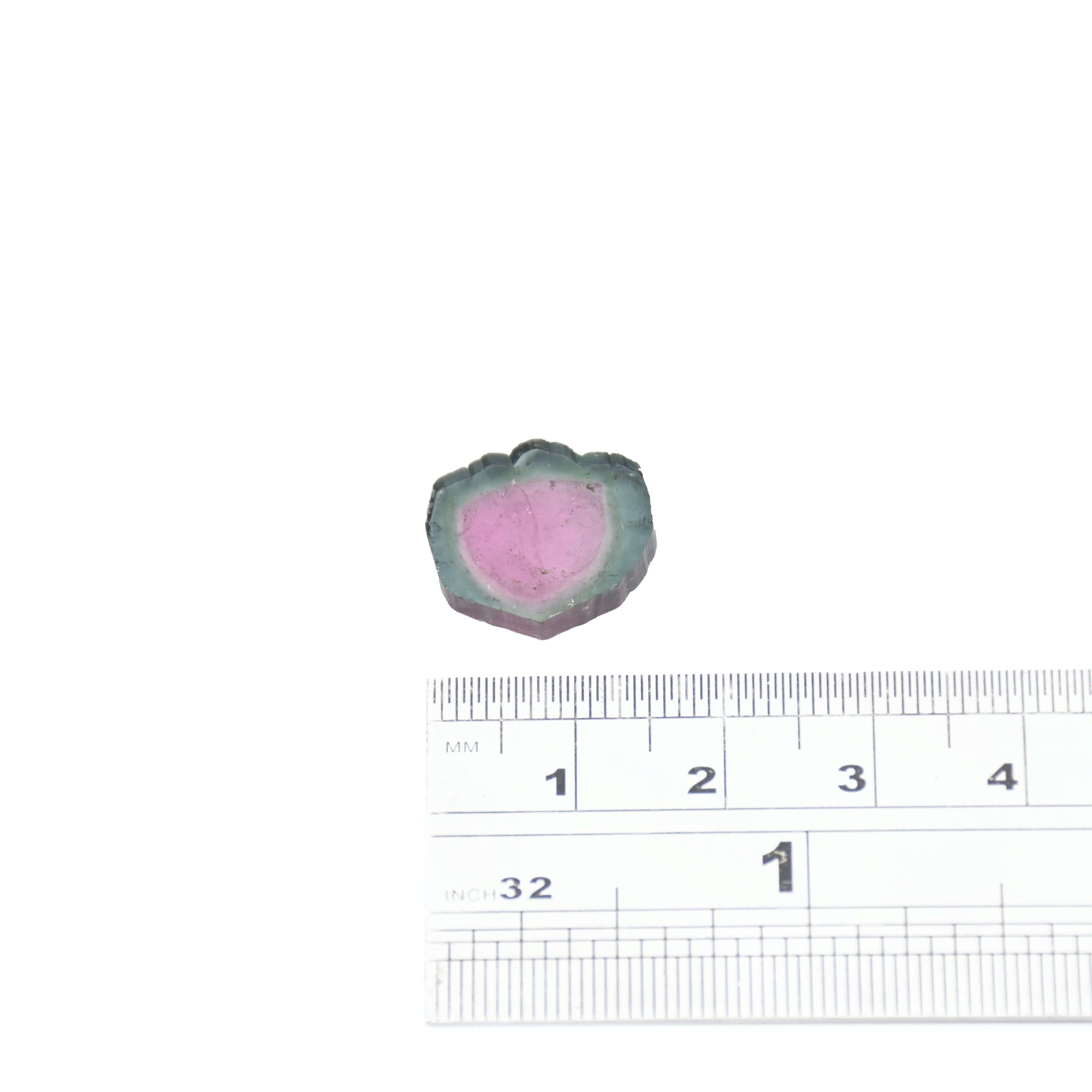A teal and pale pink genuine watermelon tourmaline stone