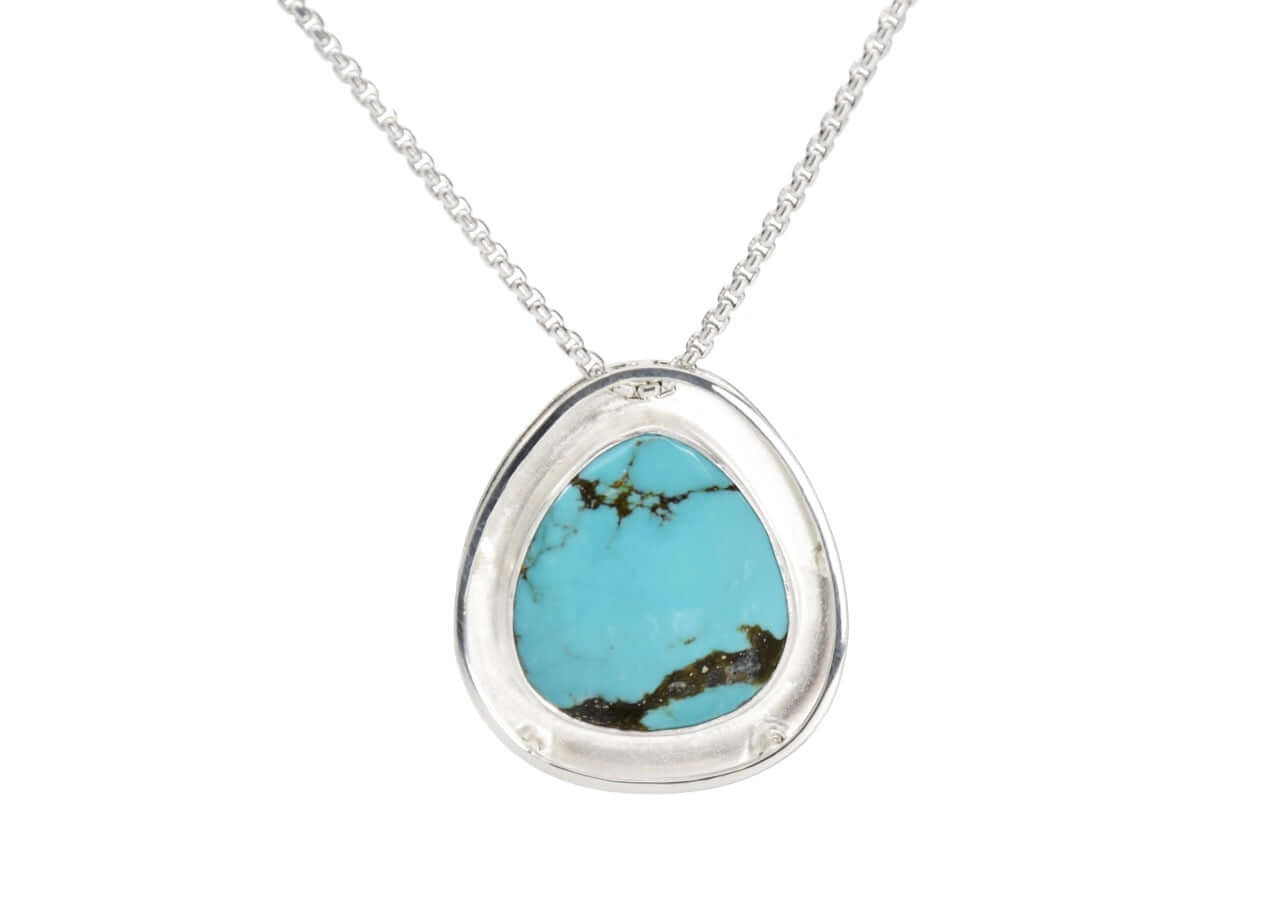 A handmade sterling silver kingman turquoise necklace