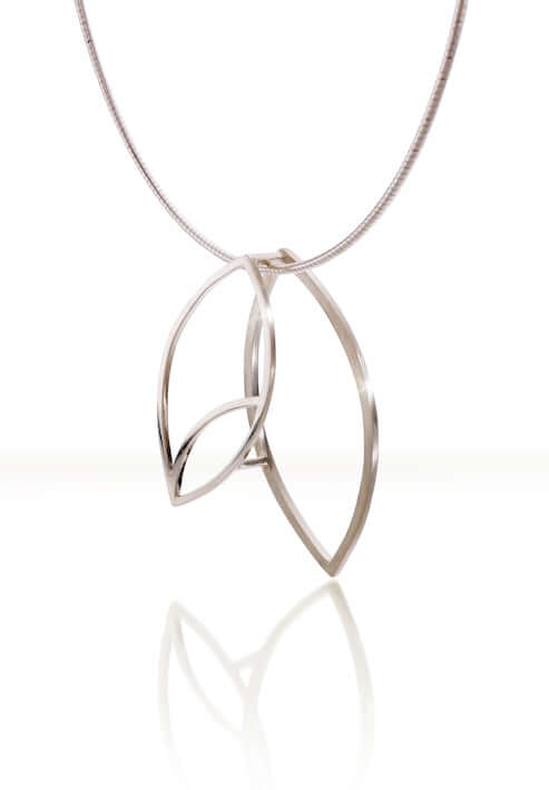 A three dimensional sterling silver leaf pendant on a silver chain