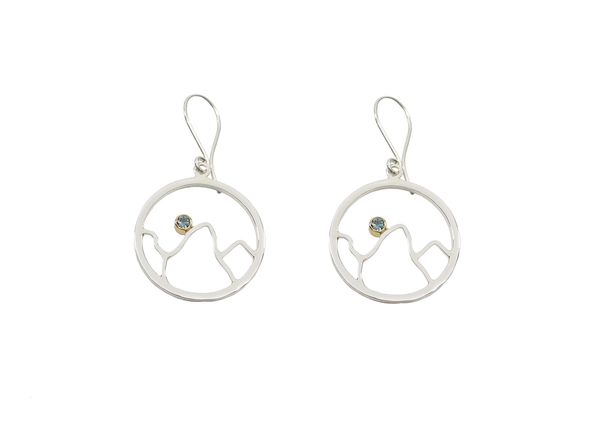 A pair of handmade mountain earrings in sterling silver