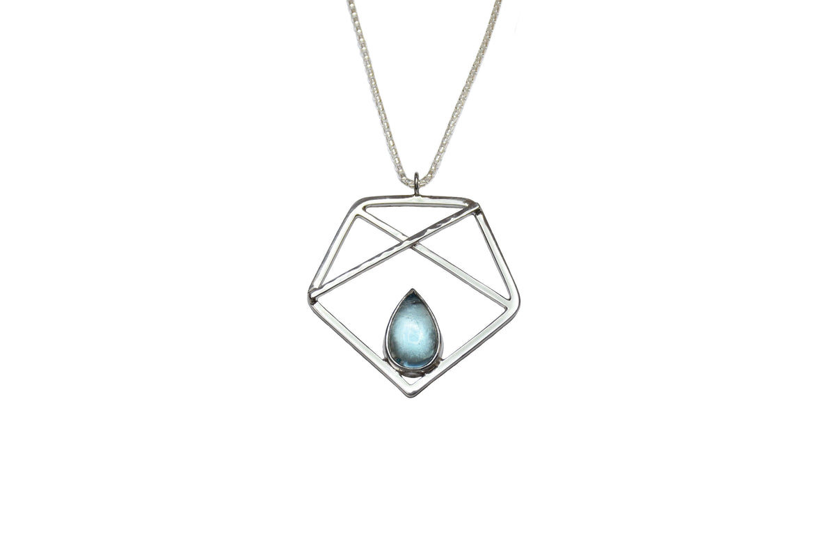 A handmade sterling silver pentagon pendant with sky blue topaz