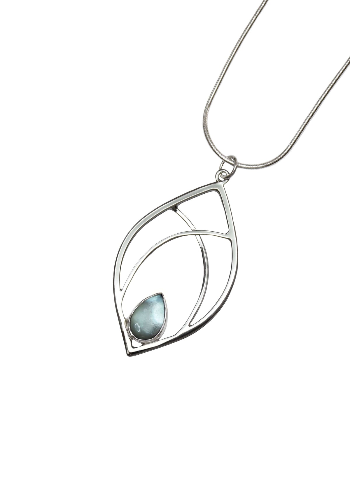 a handmade sterling silver leaf shaped pendant with sky topaz