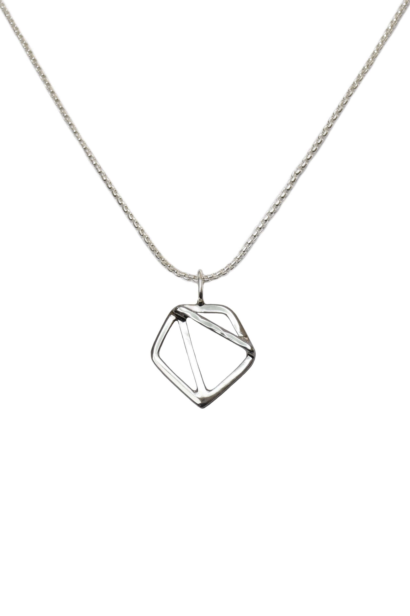 A mini handmade sterling silver pentagon pendant on a silver chain